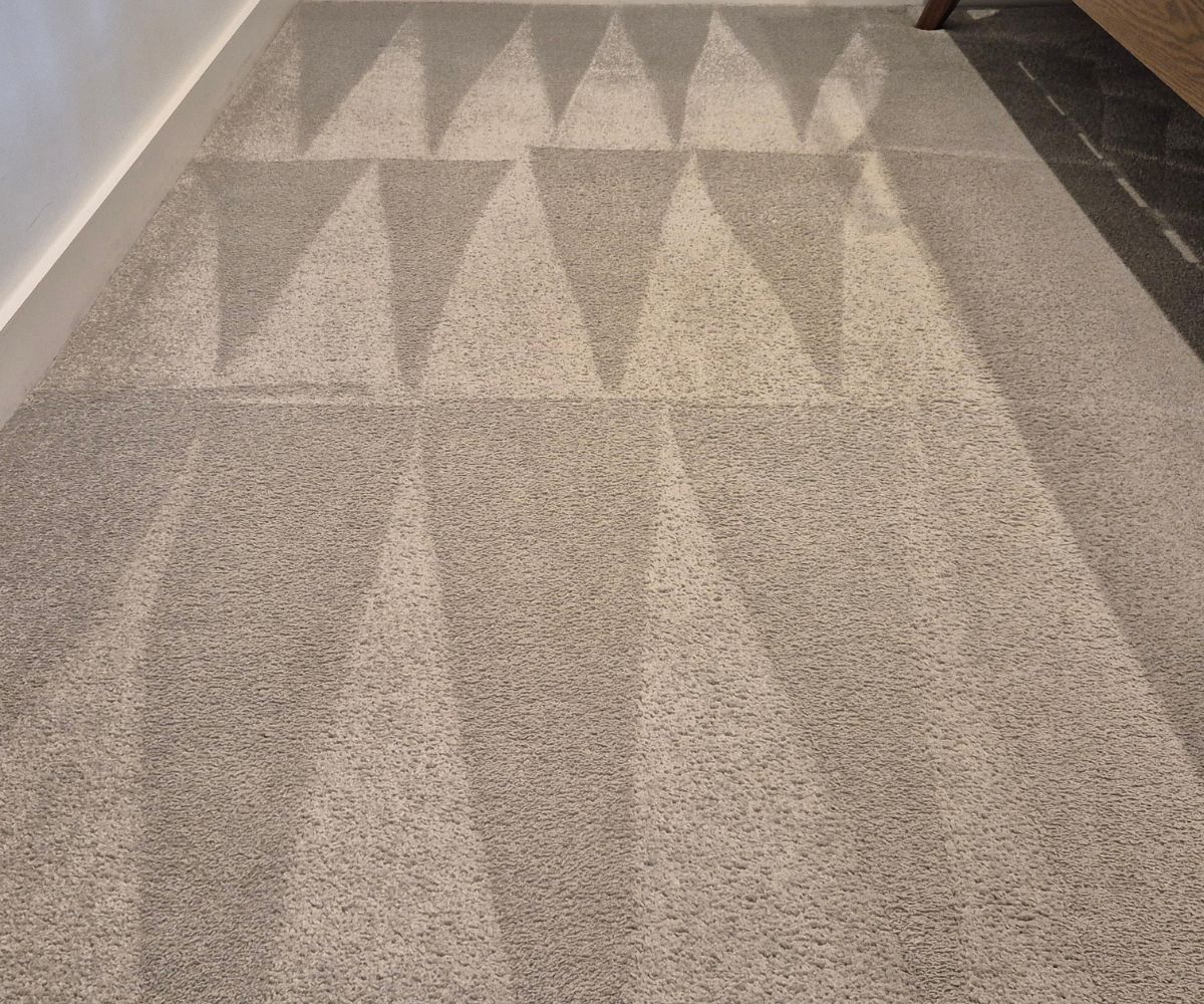 Professionally cleaned carpet with lifted fibres in a Salford apartment, Manchester.